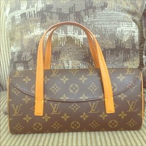 Authentic Louis Vuitton Sonatine handbag.